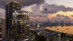 Vice City waterfront at sunset with high-rise buildings and a helicopter in an official GTA VI screenshot